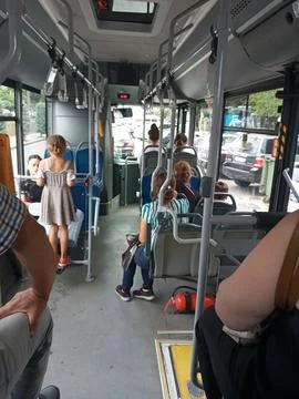 Bus interior with passengers rear view Fotos de archivo