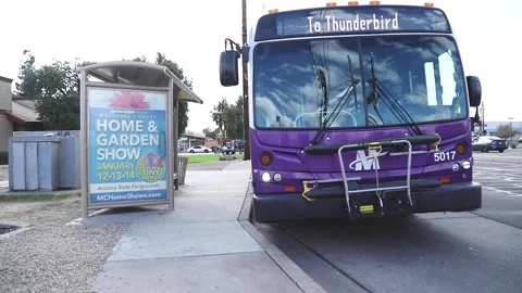 Bus Leaving the Bus Stop Stock Footage 147906412