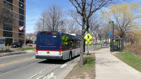  Bus leaving   college town Video stock 49341953