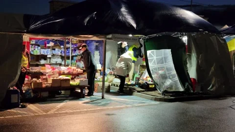 Bus Loads of Ukrainians Waiting to escape Ukraine into Poland at Border 動画素材 239596206
