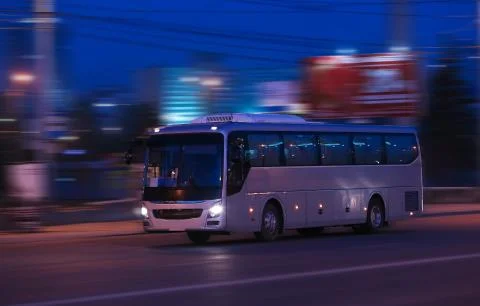 Bus moves at night Stock Photos