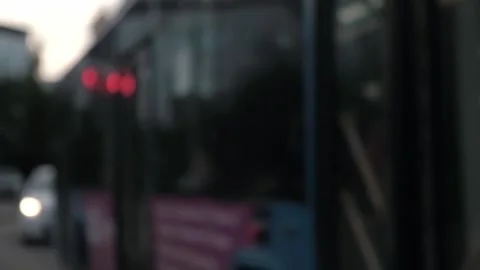 Bus is moving fast in flow city highway. blurred busy street traffic interchange Video stock 254536633