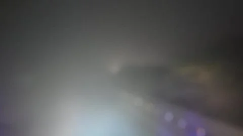 Bus moving slowly on road in dense fog with zero visibility Stock-Footage 325564988
