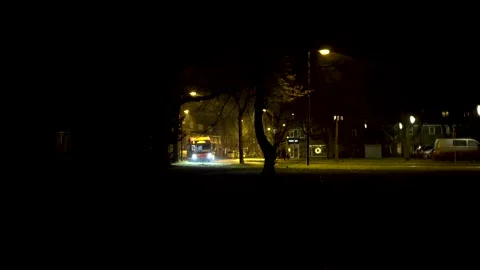 Bus by night passing by Stock Footage 145158070