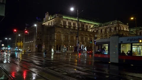Bus parked at bus stop at night in Europrean city Stock Footage 122175850