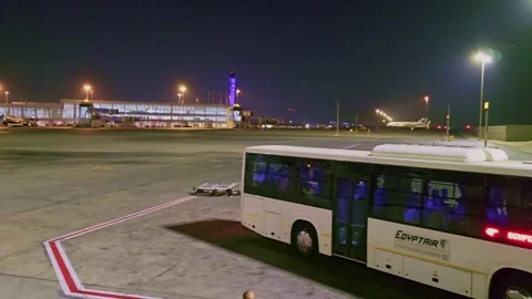 A bus parked on the tar Stock Footage 291918193