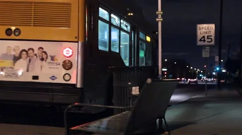 Bus pass by at bus stop Stock Footage 47464838