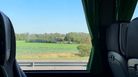 Bus passenger side window view travelling in Lithuanian countryside 動画素材 278451701