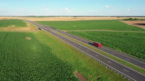 Bus With Passengers Rides On Intercity Highway Background Of Agricultural Fields Stock Footage 143206470