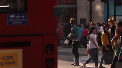 Bus Passes in front of Busy London Streets in Slow Motion Stock Footage