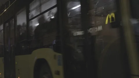 Bus passes Lviv Opera House at night Stock Footage 104802153