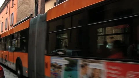 Bus passes by the street with historical buildings in Bologna, Italy. Stock Footage 59793298