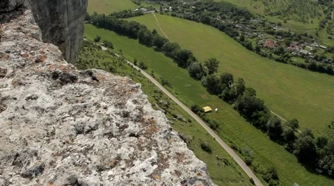 Bus passes under a mountain  Stock-Footage 53779812