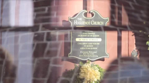 Bus passing in front of sign Stock Footage 45533940