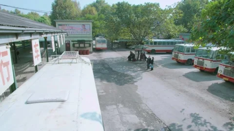 The bus pulled out of the station Stock Footage 235265054