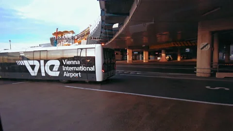 Bus ride after plain landed view true window of an airport bus. Airport work Stock Footage 133596028