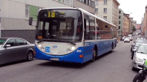 Bus rides on the street Stock Footage 44263956