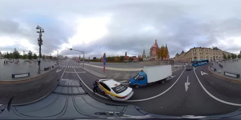 A bus that runs on electricity is driving through the city of Moscow. Stock Footage 247321374