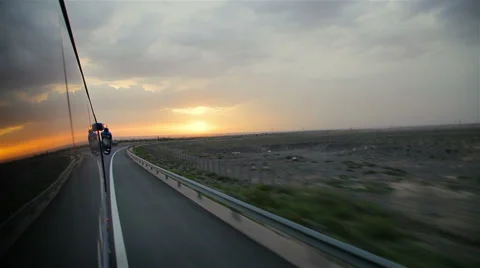 Bus runs on the highway at sunset,China. Stock Footage 56349522