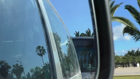 Bus side mirror view driving in Moroccan city Vídeos de archivo 101863461