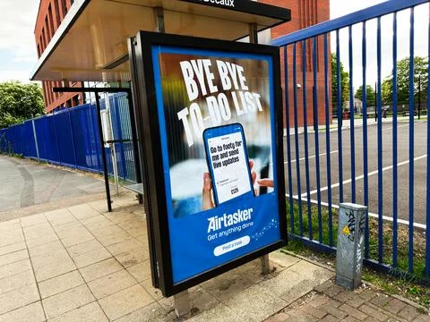 Bus stop advertisement for Airtasker reading 'Bye bye to do list' at a stre.. Stock Photos
