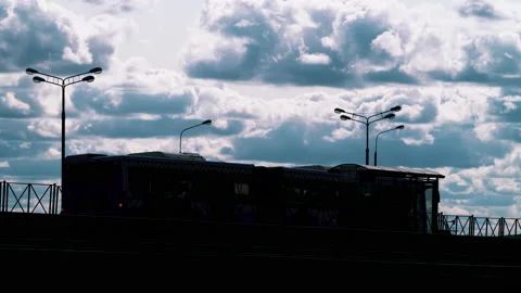 Bus stop and road traffic on clouds background, time lapse video Stock Footage 145286630