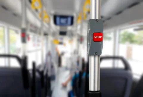 Bus stop button with empty seats Stock Photos