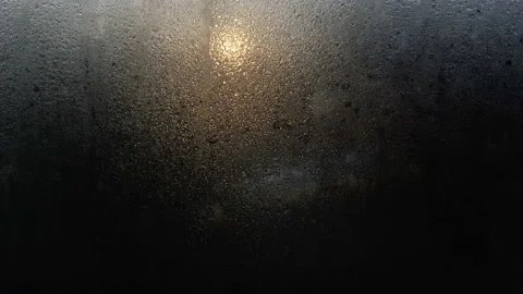 Bus stop glass backlit by winter sun, morning - Abstract lights and images Stock Footage 145207242