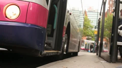 Bus Stop  Passengers Alight HD  Stock Footage 10681473