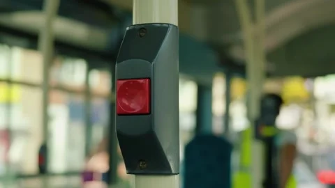 Bus stop request button inside modern electric city bus. Red passenger control Stock Footage 347264364