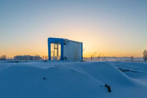 Bus stop in snow during sunset in Erzurum, Turkey Stock Photos