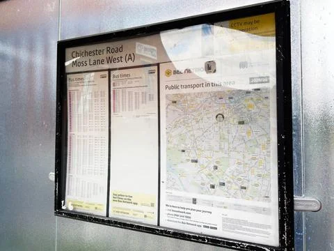 Bus stop timetable and public transport information display at Chichester R.. Stock Photos
