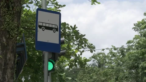 Bus stop traffic sign, medium shot of Indonesian road signage Stock Footage 139379854