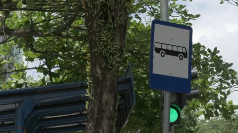 Bus stop traffic signage, medium shot Indonesian road sign Stock Footage 139379994