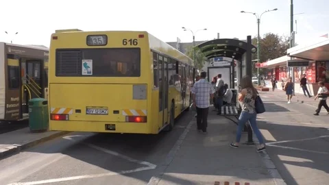 Bus stops at the station Stock Footage 90815136