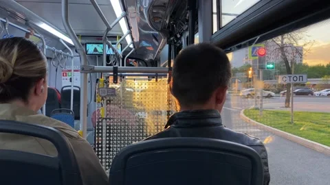 Bus stops at traffic light. Passengers in public transport. Сars on crossroads Stock Footage 196203388