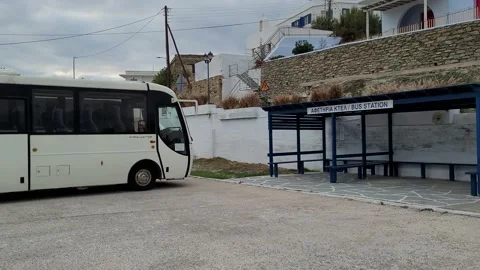 Bus terminal, bus, sunset, overcast, island, Greece, transportation Video stock 169601438