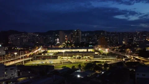 Bus terminal, highway interchange, downtown on background Latin America |Aerial Stock-Footage 152907245