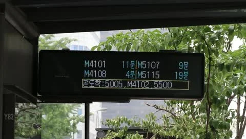 Bus timetable signboard at bus stop in Seoul Stock Footage 11133227