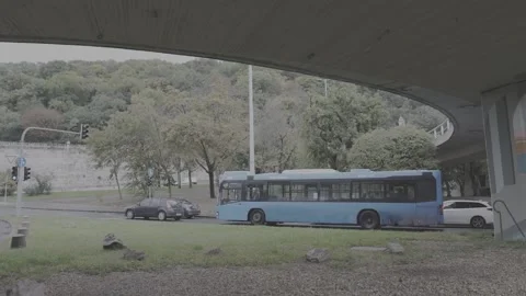 Bus under Elizabeth bridge Stock Footage 166090597