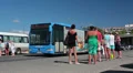 Bus waiting for departure at last stop on Coral Bay beach, Paphos, Cyprus HD Footage