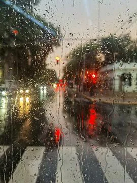 Bus window with drops on a rainy evening, Buenos Aires, Argentina Stock Photos