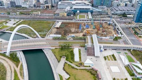 Busan station development area with ongoing construction and modern bridge Stock Photos