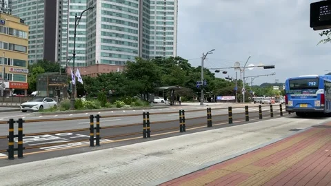 Buses depart from bus stop. Movement of cars traffic. Seoul, South Korea Stock-Footage 306573682