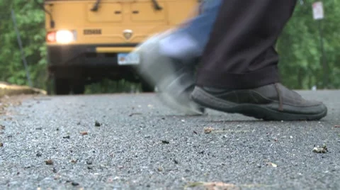 Buses leaving school. (2 of 2) Stock Footage 8696248