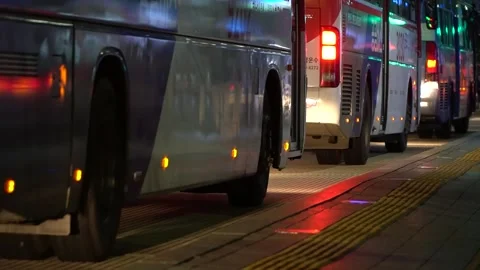 Buses line up to pick up passengers at the Gangnam Bus Station in Seoul, Stock Footage 161216997