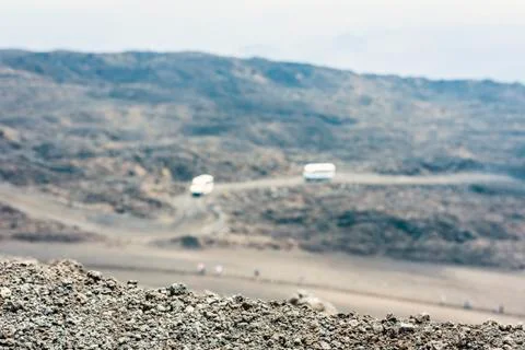 Buses on Mount Etna, active volcano on the east coast of Sicily, Italy. Stock Photos