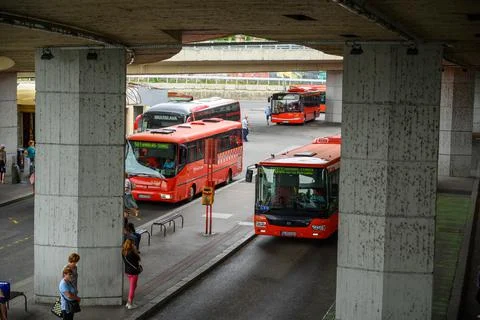Buses stopped at bus stops beneath Most SNP bridge Stock Photos