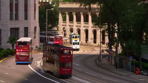 BUSES TRAMS TAXIS BEND CENTRAL HONG KONG Stock Footage 67009469