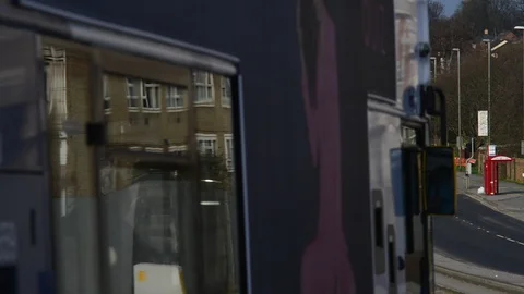 Buses using guided bus lane in the city of leeds uk Stock Footage 88616318